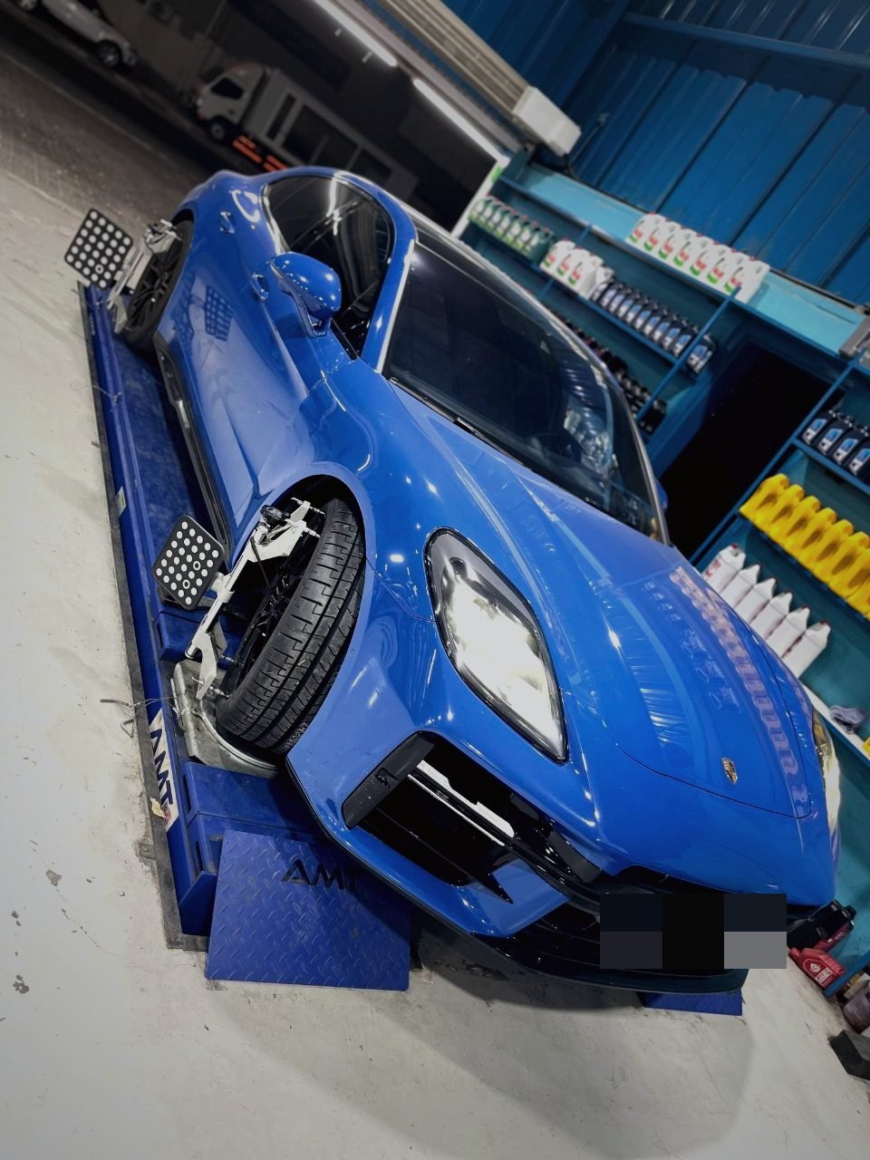 Porsche on the wheel alignment rig